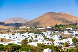 View of the village of Uga in the background of the volcanic landscape. Lanzarote. Canary Islands